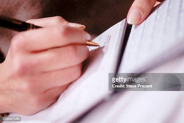 filling out forms - human body part stock pictures, royalty-free photos & images