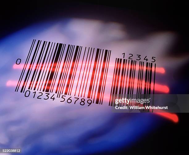 scanning a barcode - código de barras imagens e fotografias de stock