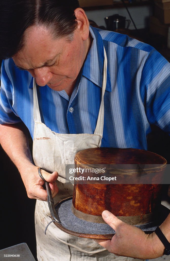 Man Making a Top Hat