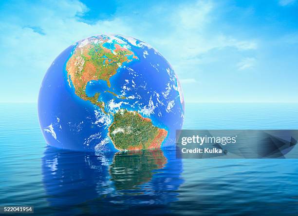 earth floating in water - water wastage stock pictures, royalty-free photos & images