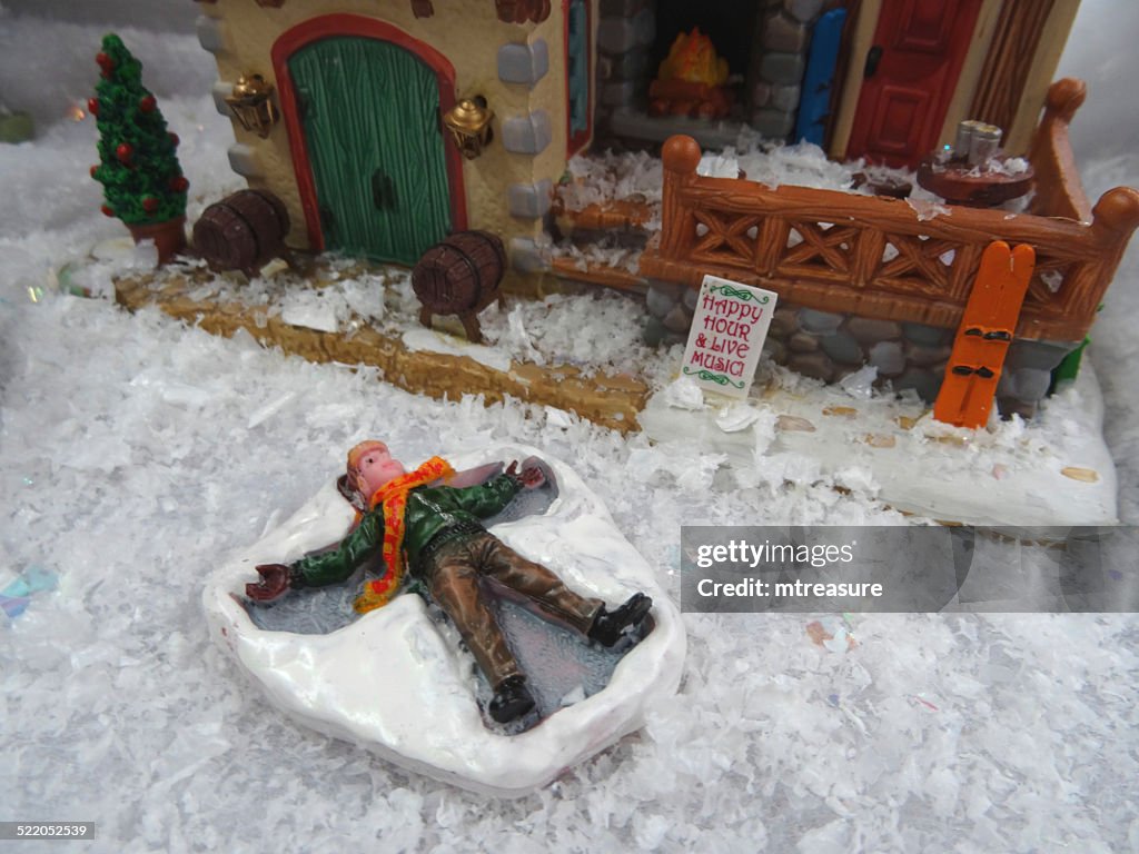 Image of model Christmas village , miniature houses, people, snow-angel child