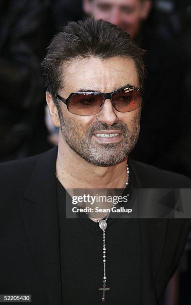 Singer George Michael arrives at the "George Michael - A Different Story" World Premiere at Kino International during the 55th annual Berlinale...