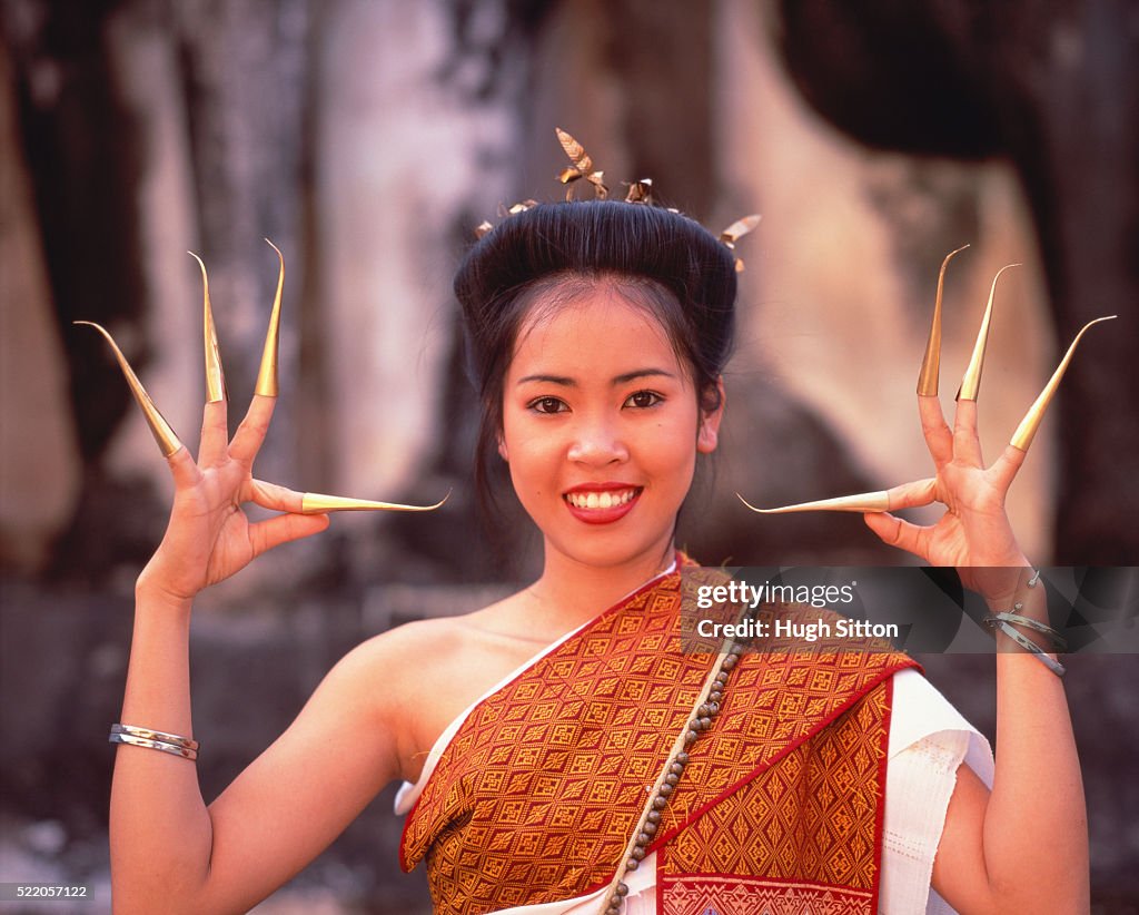 Young woman with outstretched arms