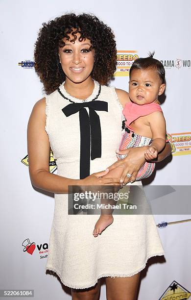 Tamera Mowry and her daughter, Ariah Talea Housley arrive at the 7th Annual Milk + Bookies' Story Time celebration held at California Market Center...