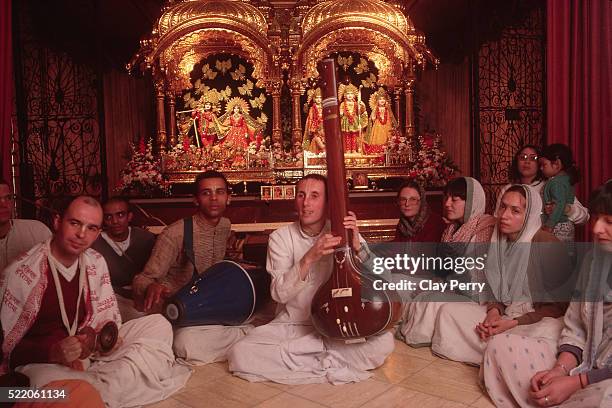 group of hare krishnas - international society for krishna consciousness stock pictures, royalty-free photos & images