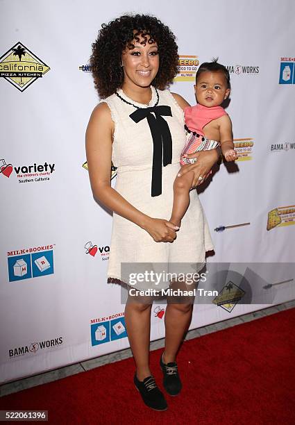 Tamera Mowry and her daughter, Ariah Talea Housley arrive at the 7th Annual Milk + Bookies' Story Time celebration held at California Market Center...