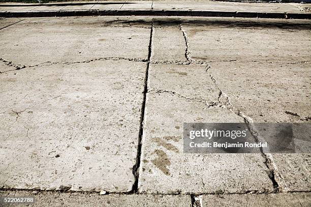 cracked street - sidewalk stock pictures, royalty-free photos & images