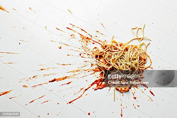 spaghetti and sauce spilled on kitchen floor - spagetti stock pictures, royalty-free photos & images