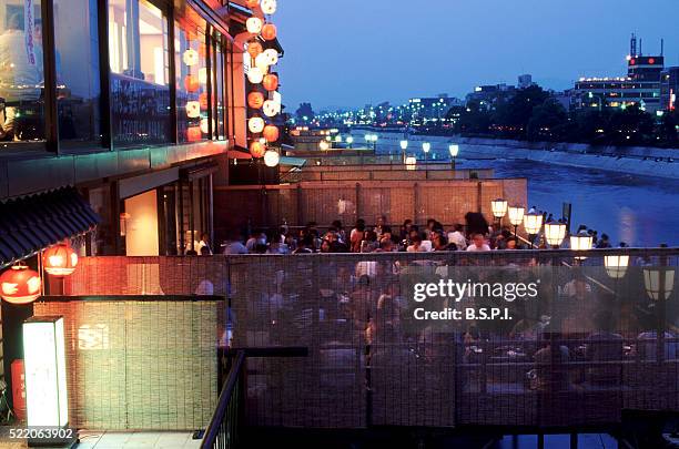 kyoto restaurant - japan - kamo river stock pictures, royalty-free photos & images