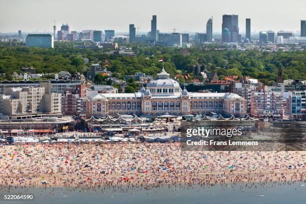 netherlands, scheveningen, people sunbathing on beach - ハーグ ストックフォトと画像