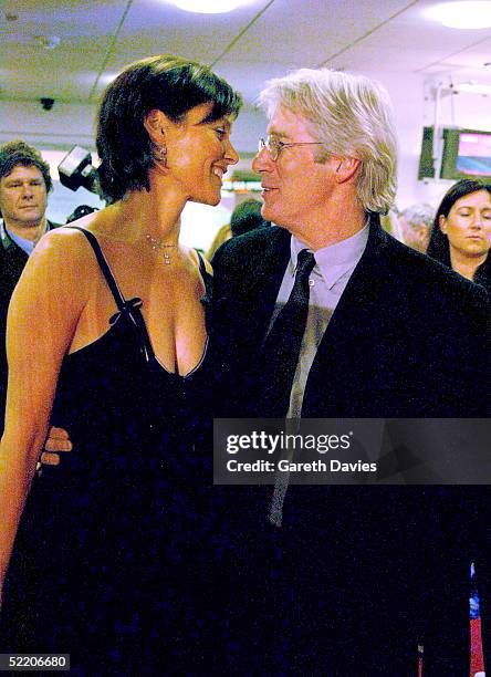 Actor Richard Gere and his wife Carey Lowell arrive at the UK Premiere of "Shall We Dance" at the Odeon West End on February 16, 2005 in London.