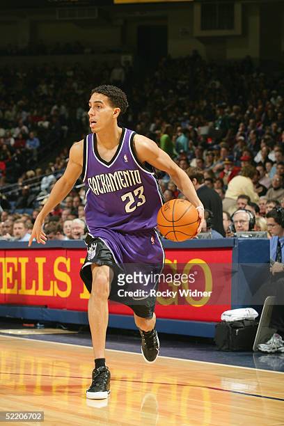 Kevin Martin of the Sacramento Kings moves the ball during the game against the Golden State Warriors at the Arena in Oakland, California. The Kings...