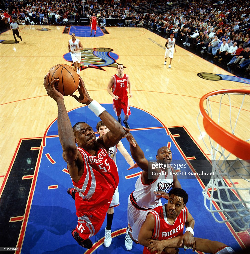Mutamba Houston Rockets Dikembe Mutombo of the Houston Rockets takes the ball to the basket ...
