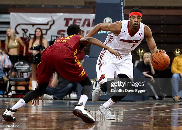 Toure Murry of the Sioux Falls Skyforce brings the ball up court against Jon Octeus of the Canton Charge during their NBA D-League Eastern Conference...