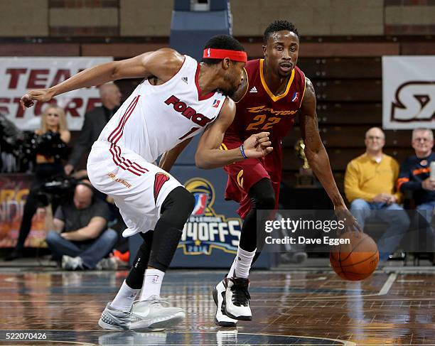 Jon Octeus of the Canton Charge brings the ball up court against Toure Murry of the Sioux Falls Skyforce during their NBA D-League Eastern Conference...