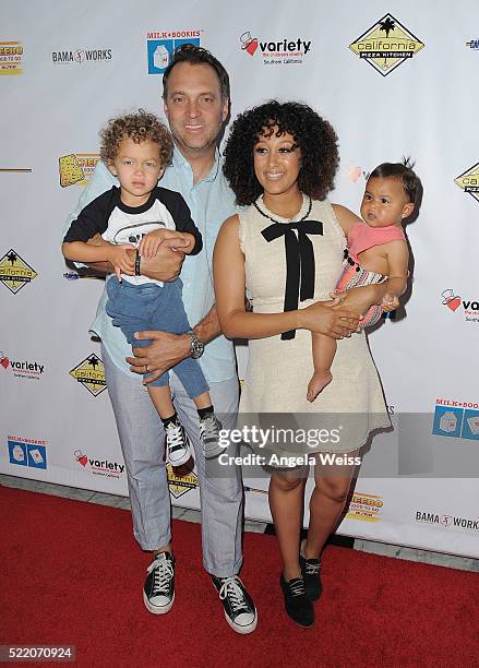 Adam Housley, Aden John Tanner Housley, Tamera Mowry and Ariah Talea Housley arrive at the 7th Annual Milk + Bookies' Story Time Celebration at...