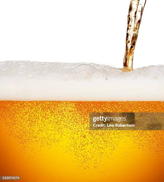 pouring beer - beer pour stock-fotos und bilder