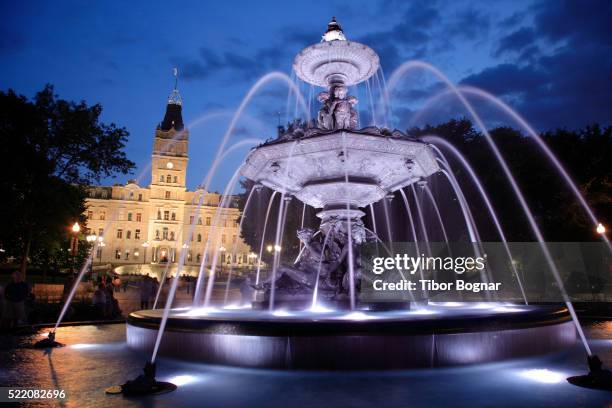 tourny fountain outside quebec's parliament building - quebec parliament stock pictures, royalty-free photos & images