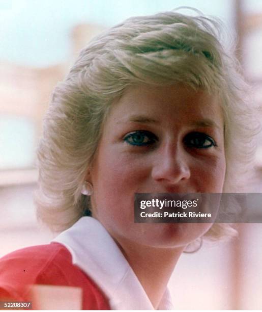 Princess Diana travels on the official train for the Bicentennial Royal Tour in Sydney, Australia.