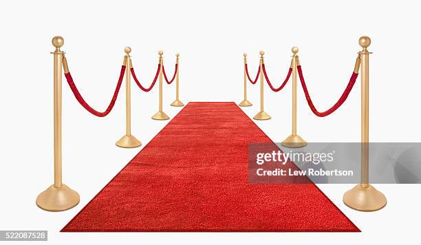 red carpet and red velvet ropes - レッドカーペット ストックフォトと画像