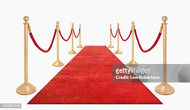 red carpet and red velvet ropes - roped off stockfoto's en -beelden