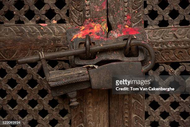 Traditional lock is seen on a temple door in Patan on March 21, 2016 in Kathmandu, Nepal. Theft of ornaments and religious idols is rife in Nepal....