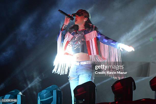 Guest singer Rihanna performs onstage with Calvin Harris during day 3 of the 2016 Coachella Valley Music And Arts Festival Weekend 1 at the Empire...