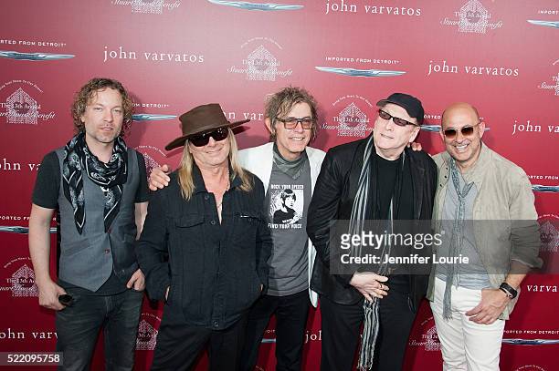Recording artists Daxx Nielsen, Robin Zander, Tom Petersson and Rick Nielsen of music group Cheap Trick and fashion designer John Varvatos arrive at...