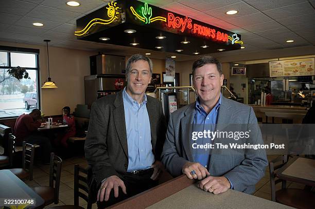 Brothers, Jim Plamondon and and Peter Plamondon, Jr., own 50 Roy Rogers franchises in six states and pose for a photograph in one near their offices...