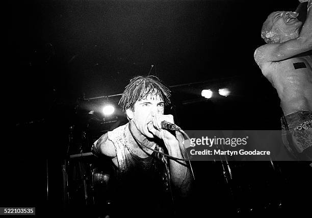Trent Reznor and Richard Patrick of Nine Inch Nails perfom on stage, United Kingdom, 1992.