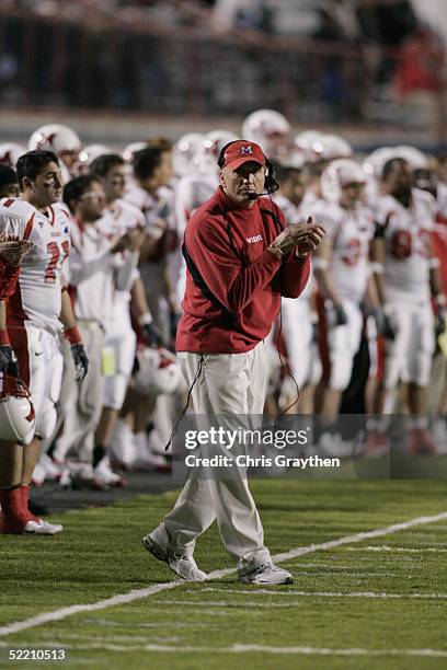 Head Coach Terry Hoeppner of the Miami University of Ohio RedHawks claps during the Independence Bowl against the Iowa State University Cyclones at...