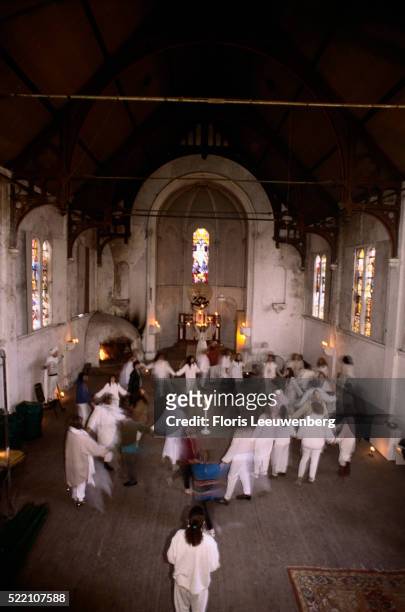 wiccans gathering in church - wicca stock-fotos und bilder