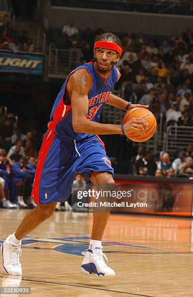 Richard Hamilton of the Detroit Pistons dribbles the ball against the Washington Wizards during the game at MCI Center on February 1, 2005 in...