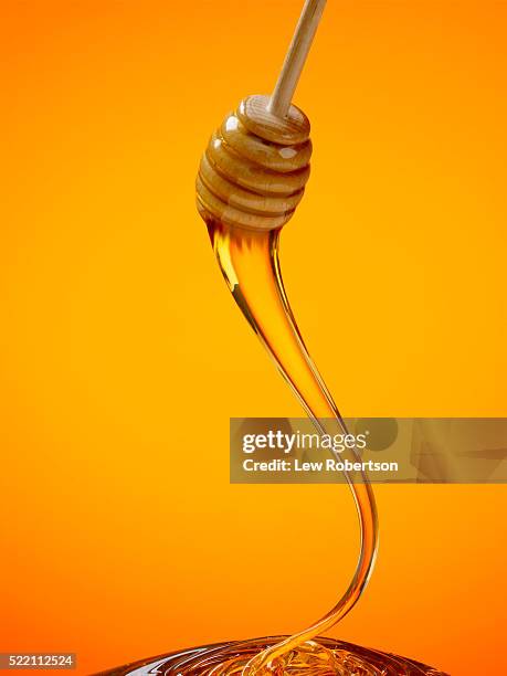 honey dipper - honey dipper stock pictures, royalty-free photos & images