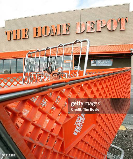 Shopping cart is seen outside The Home Depot store February 17, 2005 in Evanston, Illinois. The world's largest home improvement retailer,...
