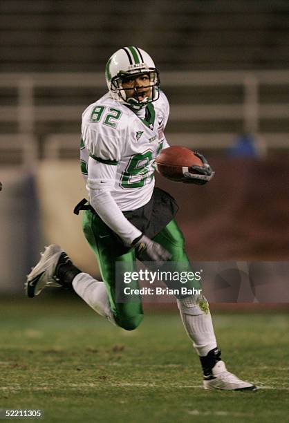 Receiver Josh Davis of the Marshall Thundering Herd runs upfield against the Cincinnati Bearcats on December 23, 2004 in the Plains Capital Fort...