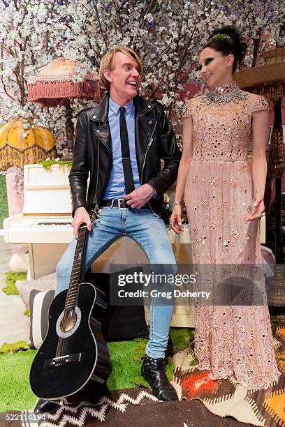 Senior Vice President of Neiman Marcus, Ken Downing and CEO and Founder of Alice & Olivia, Stacey Bendet pose for portraits before the runway show...