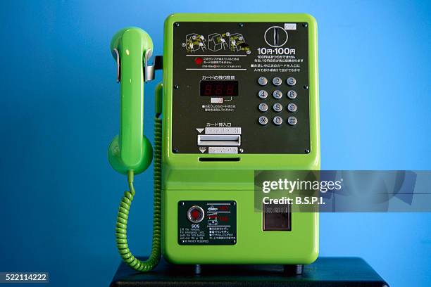 green pay phone - pay phone stock pictures, royalty-free photos & images
