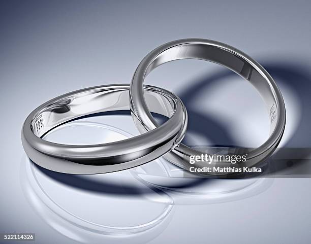 interlocked silver rings - silver ring stock pictures, royalty-free photos & images