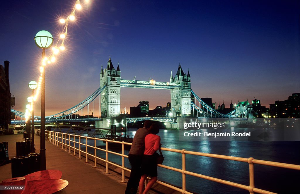 Couple by the Tower Bridge, London, England