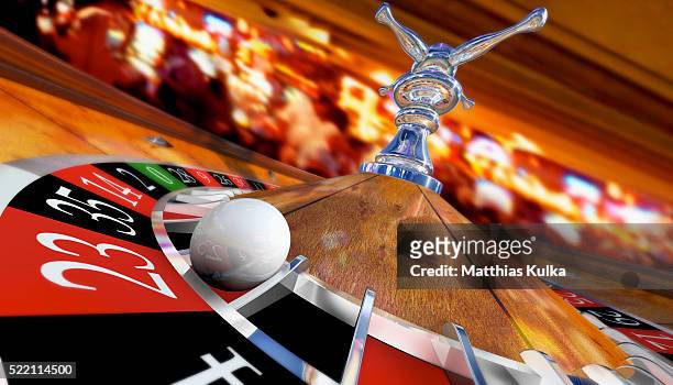 casino roulette with ball on number 23 - casino stock pictures, royalty-free photos & images