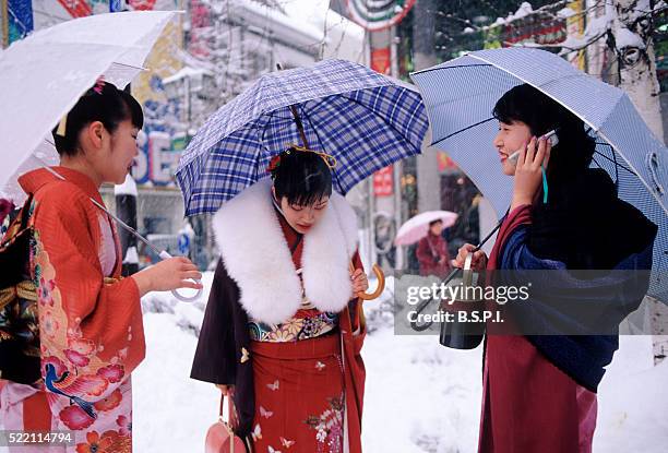 japanese friends socializing - kimono winter stock pictures, royalty-free photos & images