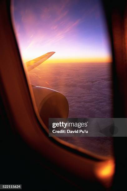 clouds viewed from airplane window - plane windows stock pictures, royalty-free photos & images