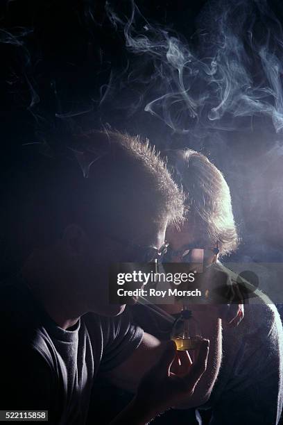 boys smoking crack - smoking crack stock pictures, royalty-free photos & images