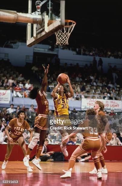 Cheryl Miller of USC Trojans puts a shot up during a 1985 women basketball game against Texas Longhorns at USC, Los Angeles, California. Cheryl...
