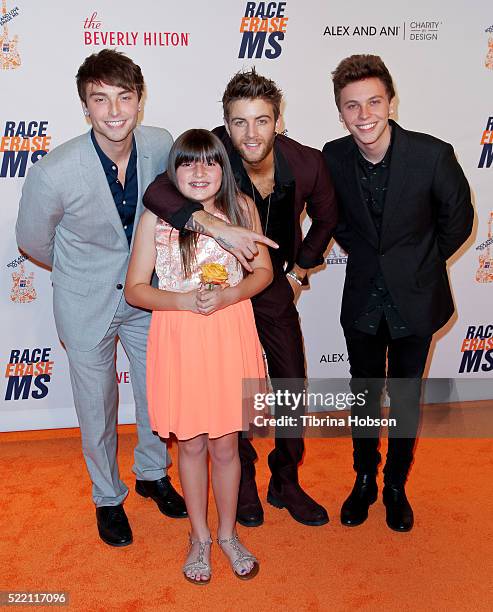 Wesley Stromberg, Keaton Stromberg and Drew Chadwick of Emblem3 and a contestant winner attend the 23rd annual Race to Erase MS Gala at The Beverly...