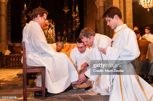 foot washig ritual in france - maundy thursday stock pictures, royalty-free photos & images