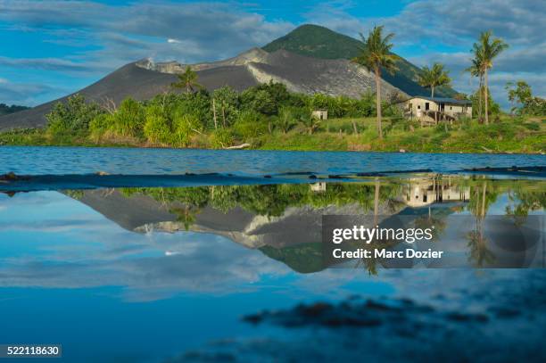 tavurvur volcano from matupit beach - papua new guinea stock pictures, royalty-free photos & images