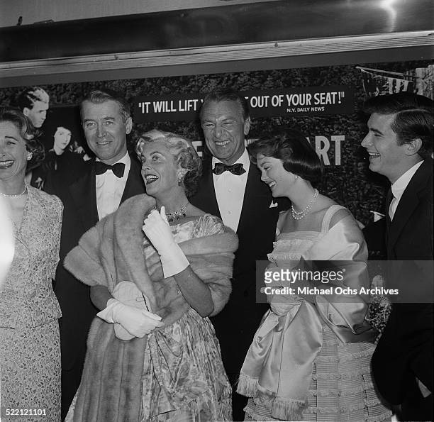Actor James Stewart and Gary Cooper with wives Gloria Stewart and Veronica Balfe attend an event in Los Angeles,CA.