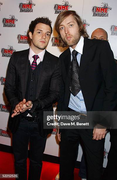 Vocalist/Keyboardist Brandon Flowers and Bassist Mark Stoermer of the The Killers arrives for The Shockwaves NME Awards 2005 at Hammersmith Palais on...